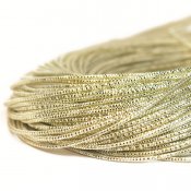 Fasetterad cannetille wire för pärlbroderier, 1mm grov, ljust guld