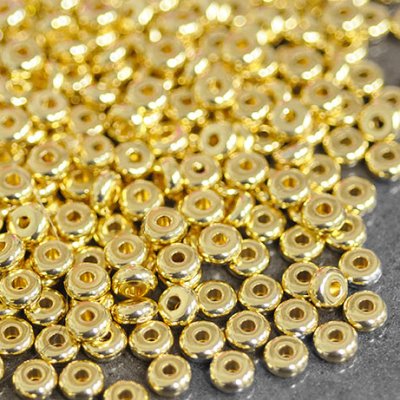 Spacers/rondelle beads, gold-plated stainless steel, approx. 6mm
